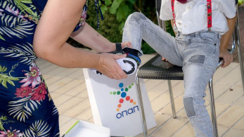 Ο ΟΠΑΠ προσφέρει παπούτσια και χαμόγελα σε παιδιά