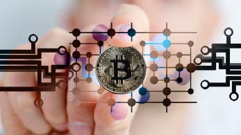 Bitcoin: Ιστορικό ρεκόρ πάνω από τα 60.000 δολάρια