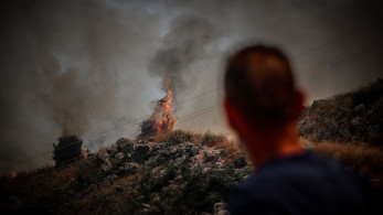 Φωτιές: αναζωπυρώσεις σε Κέρκυρα και Ρόδο - Mάχη και στην Κάρυστο