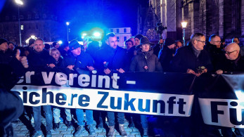 Γερμανία: το AfD μοίρασε φυλλάδια-«εισιτήρια επιστροφής» για μετανάστες